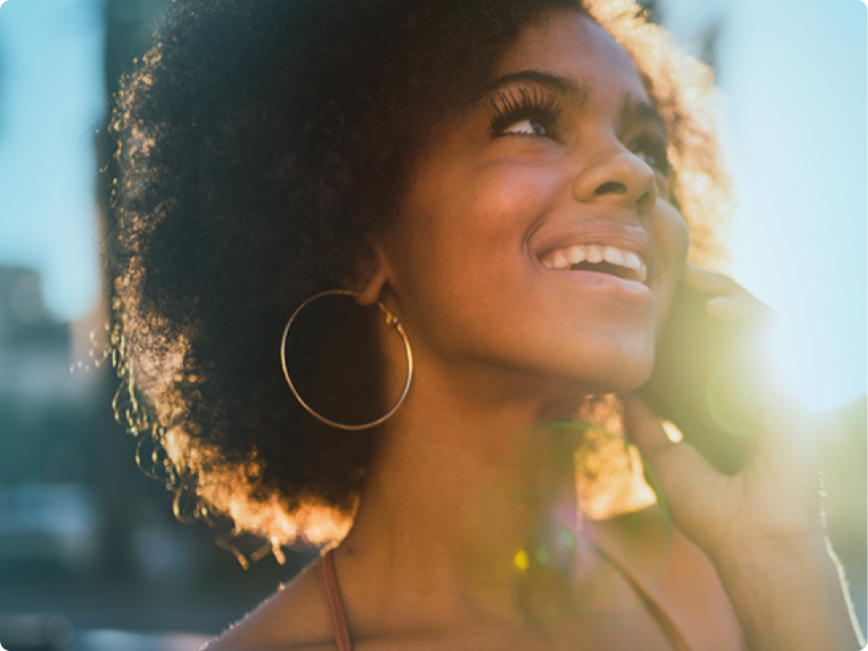 woman smiling looking up